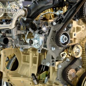 Detailed view of a modern car engine showcasing gears and mechanical components.
